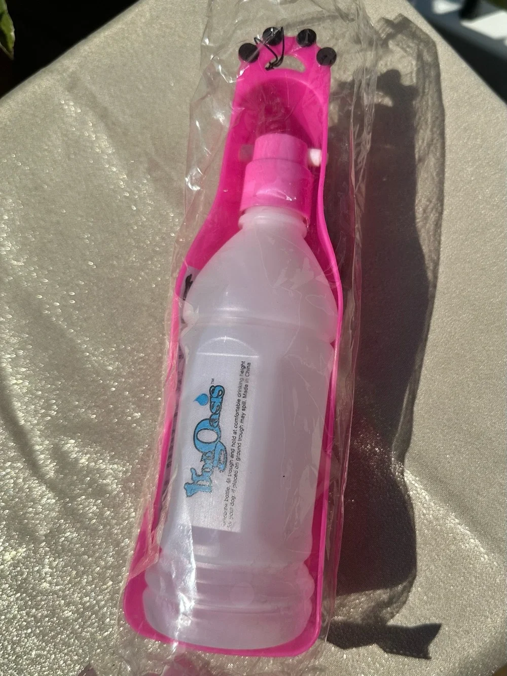 Oasis Pink Travel Bottle with Silicone Carrier for dog